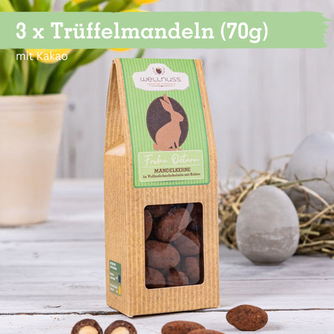 Trüffelmandeln (70g) mit Kakao im Osterdesign von Wellnuss. Köstliche Mandeln in Vollmilchschokolade, ideal für das Osterfest.