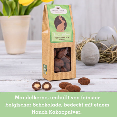 Trüffelmandeln umhüllt mit belgischer Schokolade und Kakaopulver, edel verpackt. Perfekter Genussmoment für Ostern und besondere Anlässe.