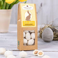 Oster Edition - Kokosmandeln mit weißer Schokolade (60 g) - wellnuss Premium Präsente