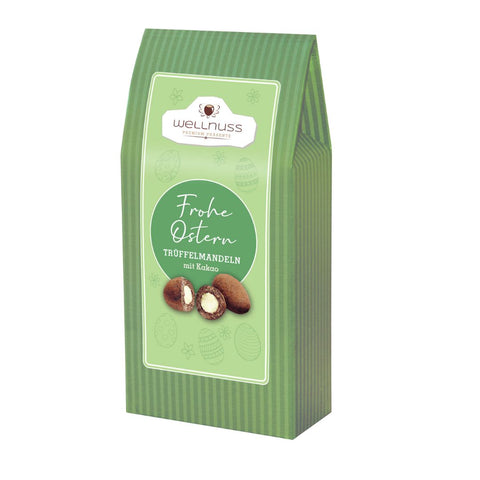 Maxi Faltschachtel der Oster Edition mit Trüffelmandeln, verpackt in stilvollem grünem Design mit Ostermotiven.