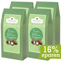 Vorteilspackung mit vier Maxi Faltschachteln der Oster Edition, Trüffelmandeln mit Kakao, 16% Ersparnis.