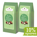 Doppelpack der Oster Edition mit Trüffelmandeln in Kakao, stilvolle Verpackung mit 10% Ersparnis.