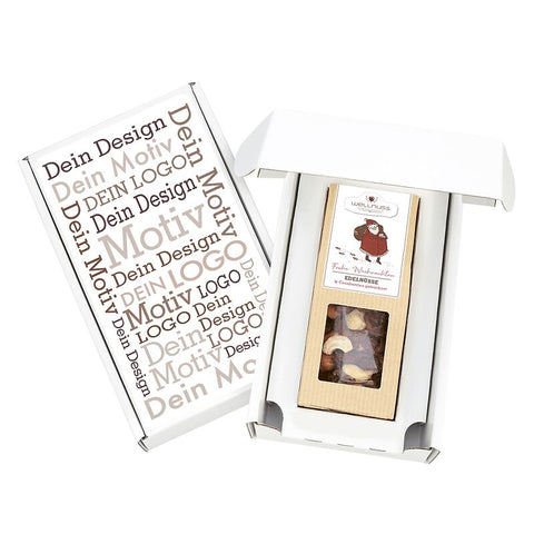 Edler Weihnachts-Snack im Geschenkkarton mit feiner Schokolade und Nüssen. Hochwertige Verpackung mit individuellem Design für besondere Anlässe.